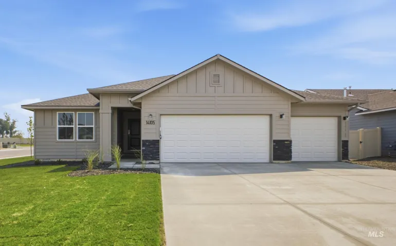 Single-story exterior with a two-car garage, stone veneer accents, and a covered entry