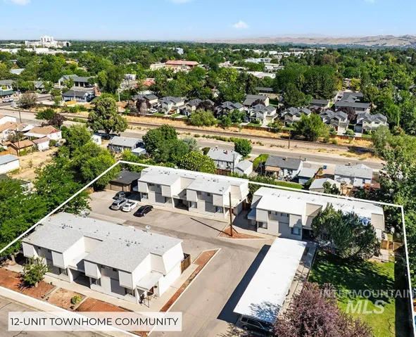 Aerial view of residential area with property parcel outlined