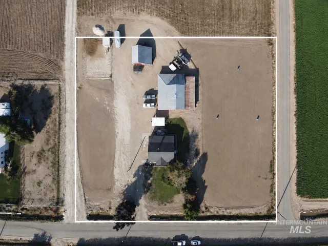 Expansive property featuring multiple structures and significant land area