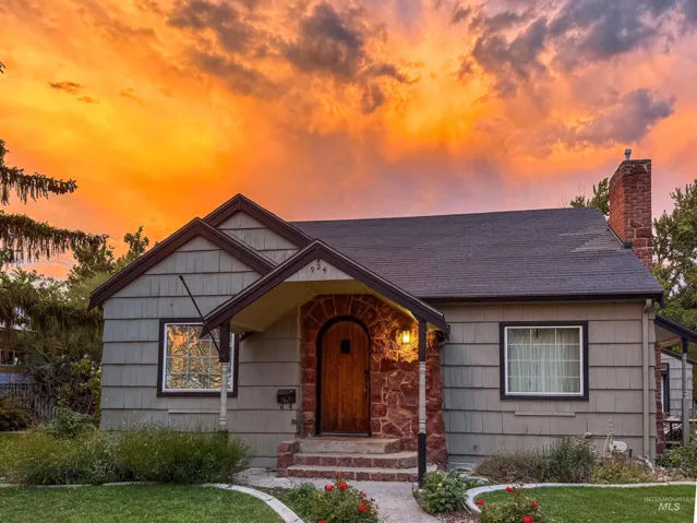 Craftsman-style exterior with shingle siding and a dark roof