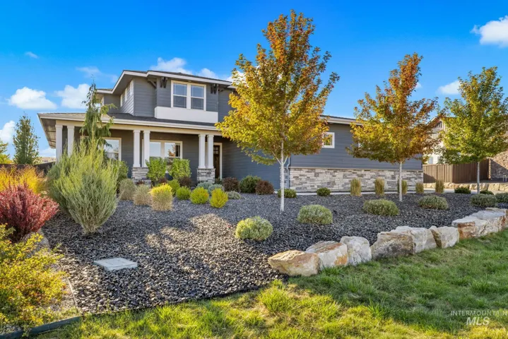 Two-story residence with gray siding and white trim