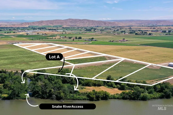 Overview of rural landscape featuring property boundaries highlighted and mountains