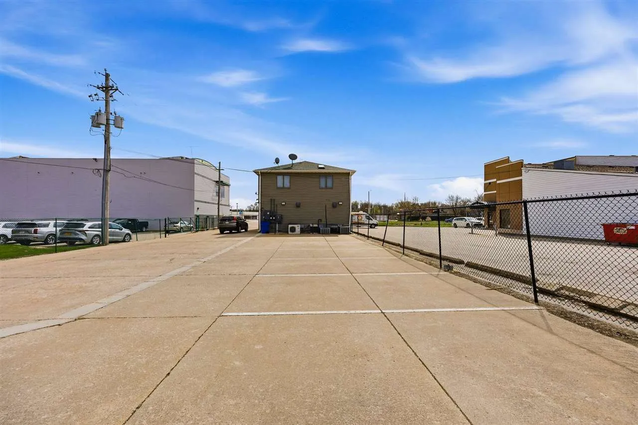 Parking in front of building or at the back.