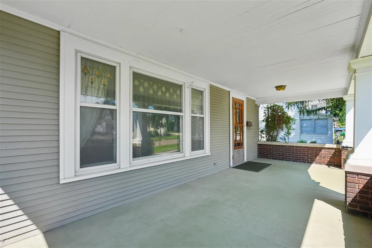 Covered Porch with hooks for swing